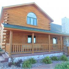 exterior-staining-log-sided-home-in-iron-ridge-wi 0