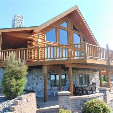 exterior-staining-log-sided-home-in-iron-ridge-wi 1