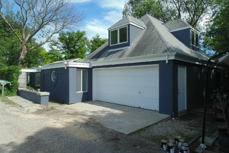 Stucco home exterior painting in wallace lake wi