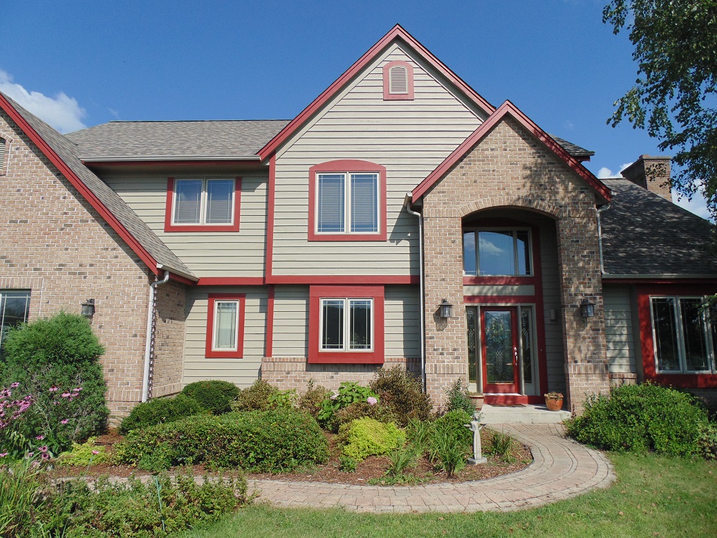 Large Cedar Sided Home Repaint in Munches/Hartland Area