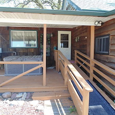 Solid-Stain-on-Cedar-Sided-Home-with-Deck 1