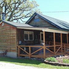 Solid-Stain-on-Cedar-Sided-Home-with-Deck 0
